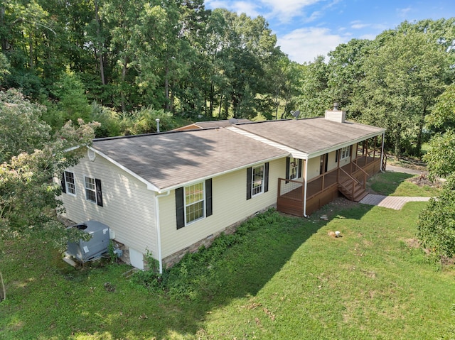 7000 Davis Ferry Rd, Loudon, TN 37774 - view of front facade featuring a porch, roof with shingles, a chimney, and a front yard