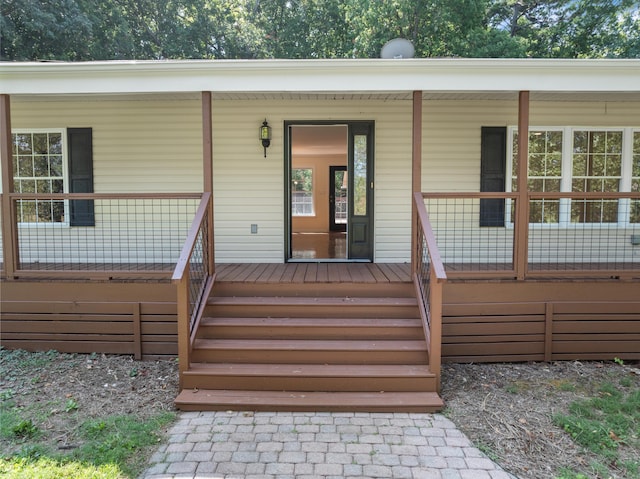 entrance to property with covered porch