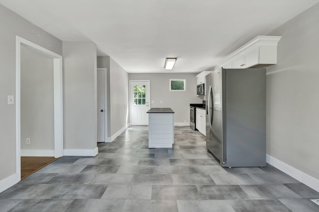 kitchen with white cabinets and stainless steel appliances