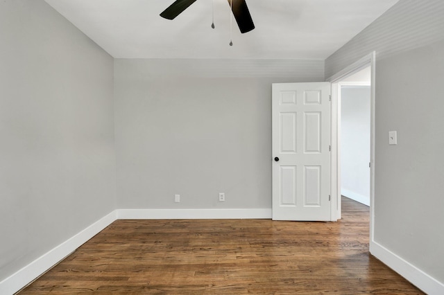 empty room featuring hardwood / wood-style flooring and ceiling fan