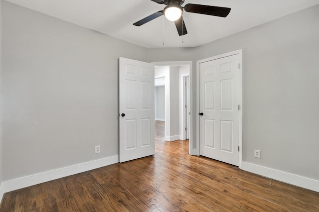 unfurnished bedroom with hardwood / wood-style flooring and ceiling fan