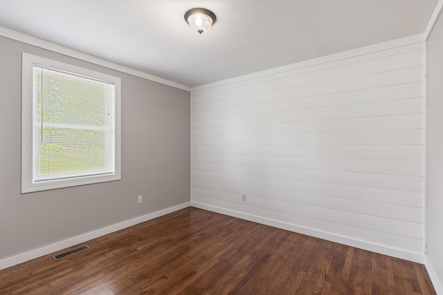 922 Barnabas St, Athens, TN 37303 - empty room featuring dark wood-style floors and baseboards