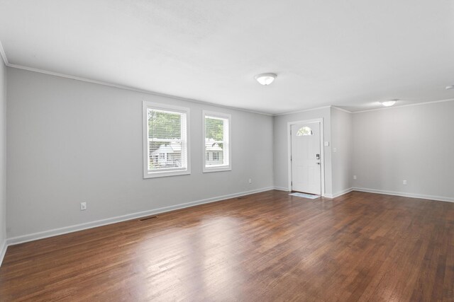 922 Barnabas St, Athens, TN 37303 - spare room featuring crown molding, dark wood-style floors, and baseboards