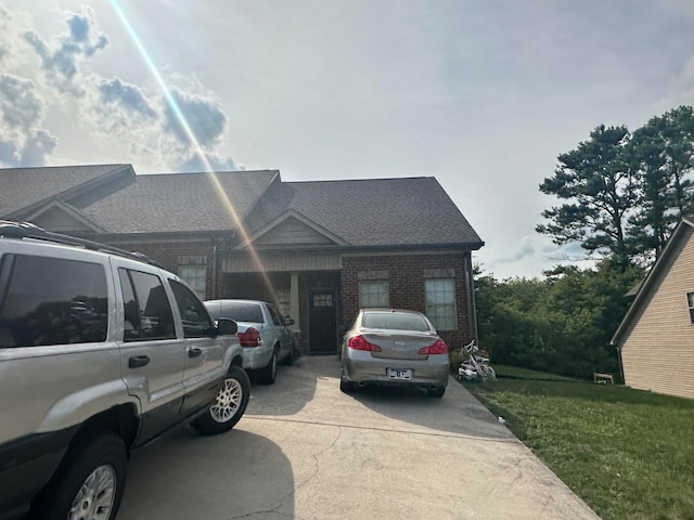 view of front of house with a front lawn