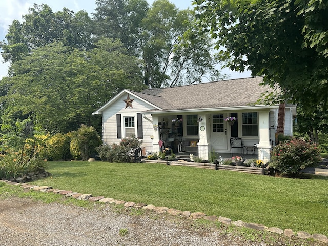 1785 Benton Station Rd, Benton, TN 37307 - view of front of property with covered porch and a front yard