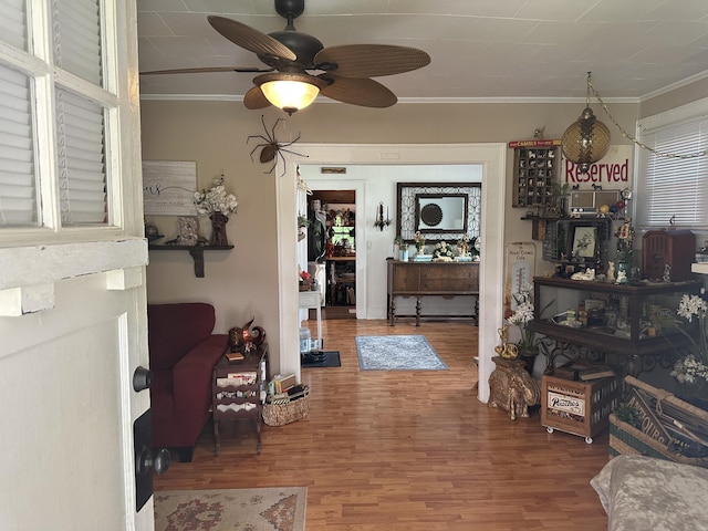 1785 Benton Station Rd, Benton, TN 37307 - dining area featuring ornamental molding, a ceiling fan, and wood finished floors