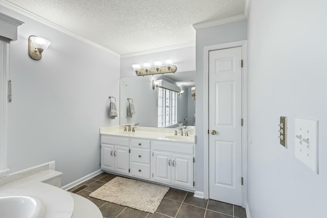 full bath featuring double vanity, ornamental molding, and a sink