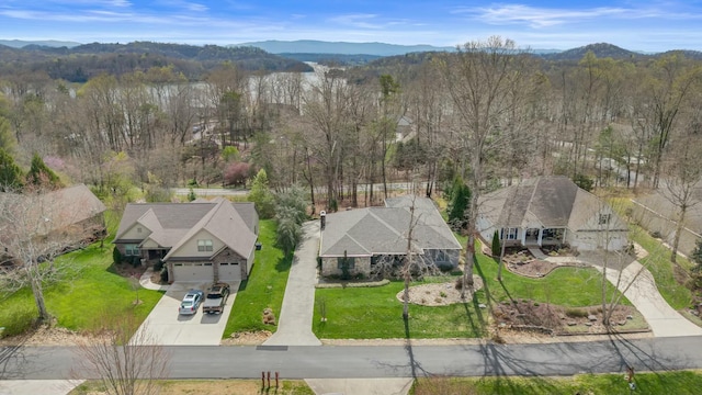 birds eye view of property with a residential view and a mountain view