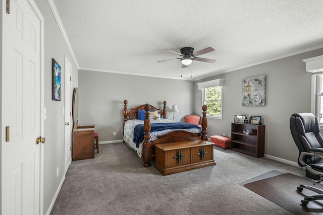 carpeted bedroom with baseboards, crown molding, ceiling fan, and a textured ceiling