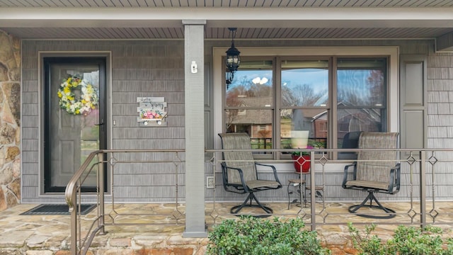property entrance with a porch