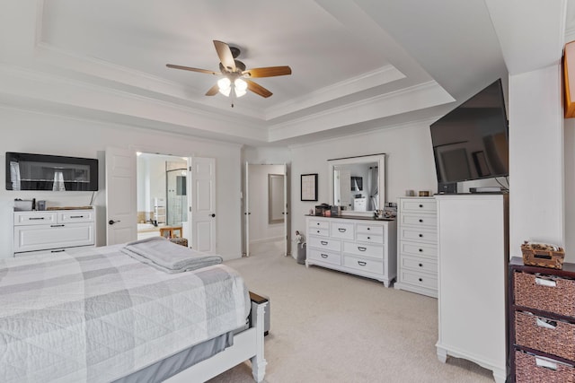 bedroom featuring ceiling fan, ornamental molding, a raised ceiling, and light carpet