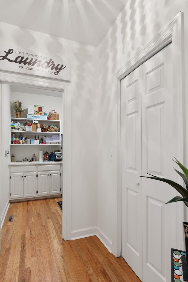 hallway featuring light wood-type flooring