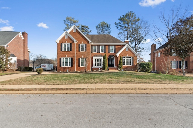 view of front facade featuring a front yard