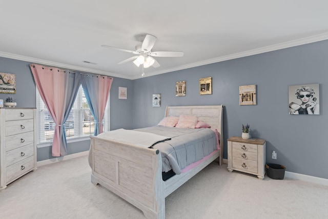 bedroom with ornamental molding, light colored carpet, and ceiling fan