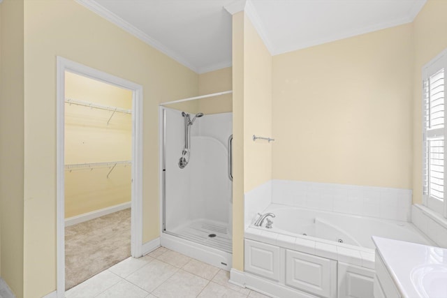 1015 Crestway Dr, Athens, TN 37303 - full bath featuring a shower stall, a whirlpool tub, crown molding, tile patterned floors, and a spacious closet