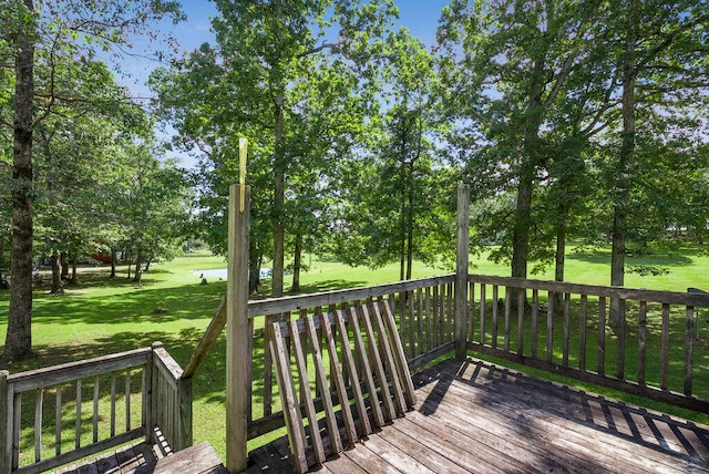 deck featuring a lawn