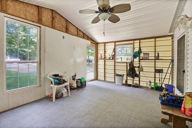 sunroom / solarium with ceiling fan, wood ceiling, a wealth of natural light, and vaulted ceiling