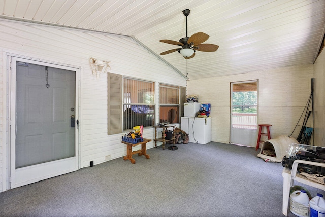 interior space with carpet, ceiling fan, wood ceiling, and high vaulted ceiling