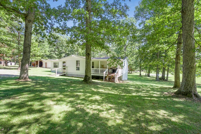 view of yard featuring a porch