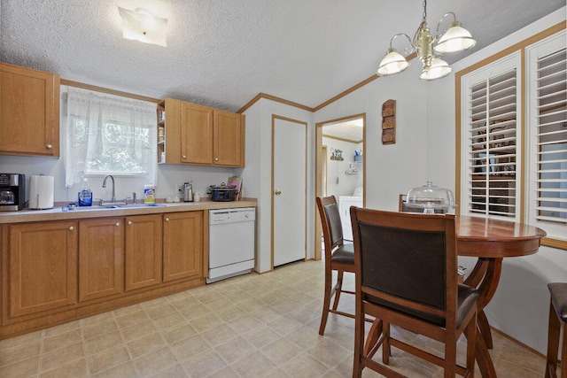 kitchen featuring a textured ceiling, sink, pendant lighting, an inviting chandelier, and dishwasher