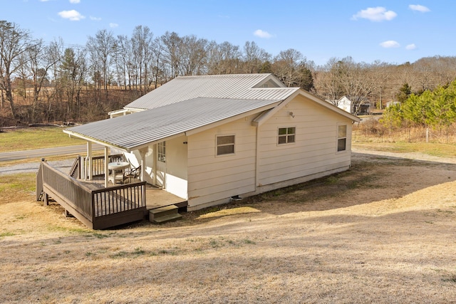 rear view of house with a deck