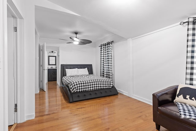 bedroom featuring ceiling fan and wood-type flooring