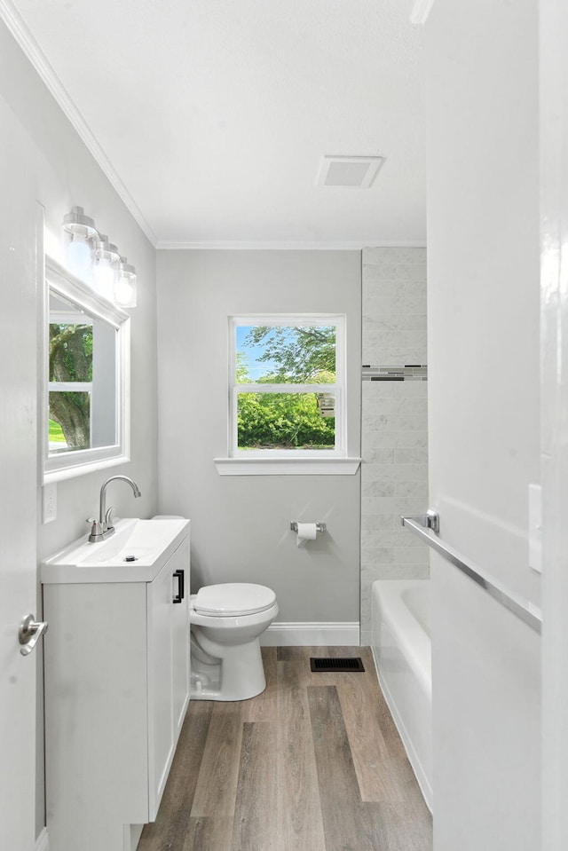 2207 Spencer Ave, Chattanooga, TN 37421 - full bathroom with vanity, wood finished floors, and ornamental molding