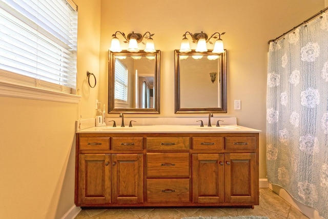 bathroom with vanity and walk in shower