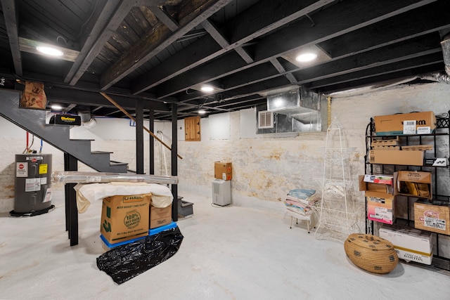 basement featuring electric water heater