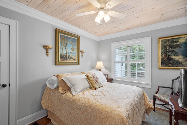 bedroom featuring wooden ceiling, ceiling fan, and crown molding