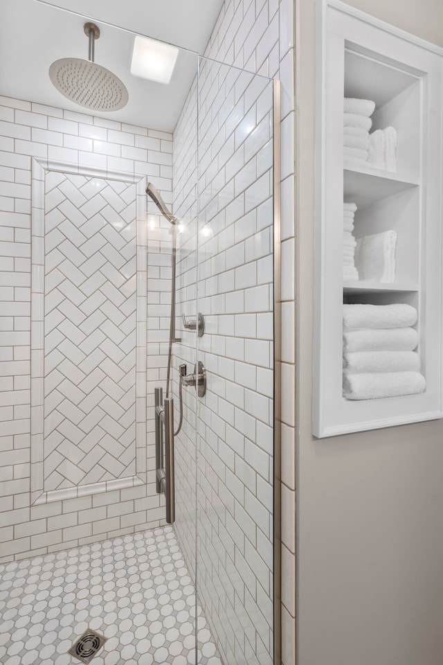 bathroom featuring an enclosed shower