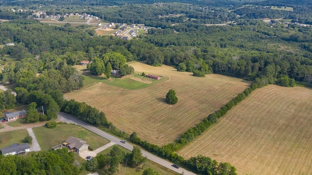 birds eye view of property featuring a rural view