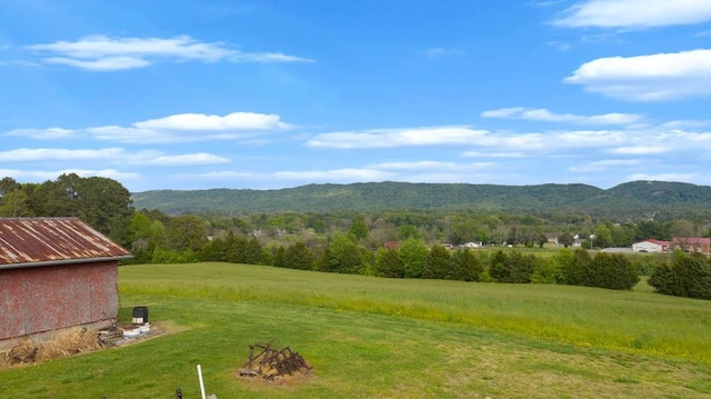 view of mountain feature with a rural view