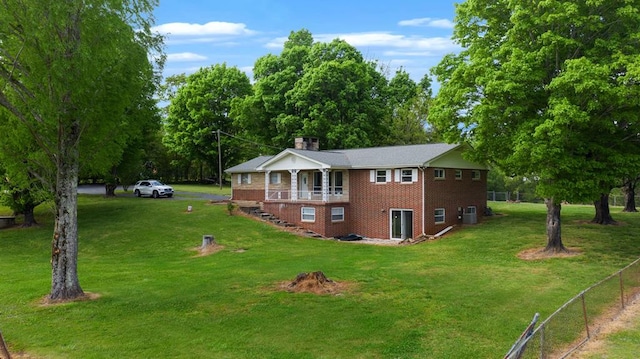 view of home's exterior featuring a lawn