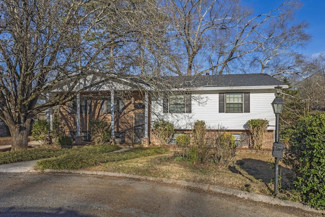 view of front of property featuring brick siding