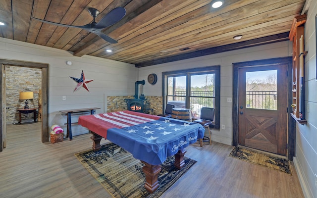 101 Hideaway Trl, Copperhill, TN 37317 - recreation room featuring a ceiling fan, wood finished floors, recessed lighting, wooden ceiling, and a wood stove