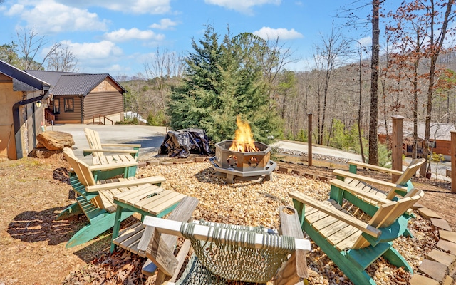 101 Hideaway Trl, Copperhill, TN 37317 - view of yard with a fire pit and a view of trees