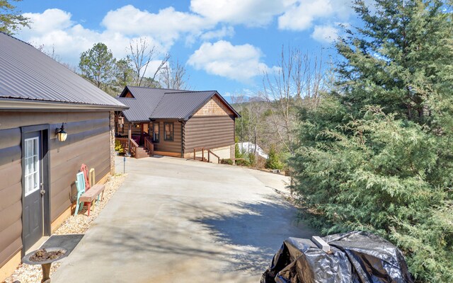 101 Hideaway Trl, Copperhill, TN 37317 - view of property exterior featuring concrete driveway and metal roof