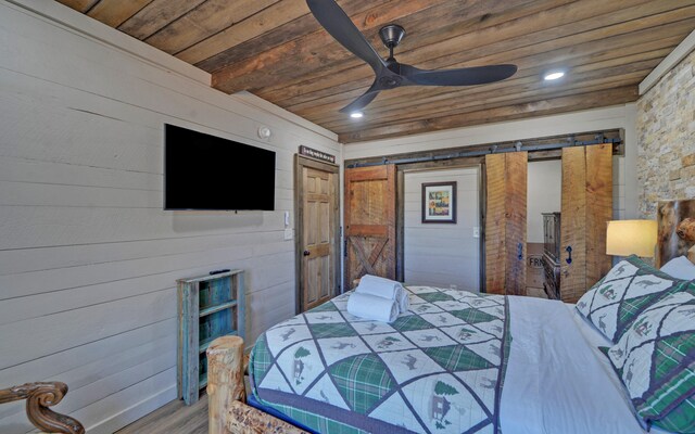 101 Hideaway Trl, Copperhill, TN 37317 - bedroom featuring wooden walls, wood ceiling, recessed lighting, wood finished floors, and a ceiling fan