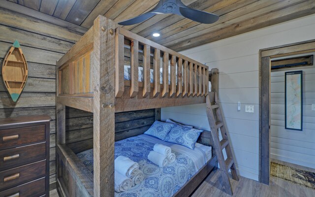 101 Hideaway Trl, Copperhill, TN 37317 - unfurnished bedroom featuring wood finished floors, wooden walls, and wood ceiling