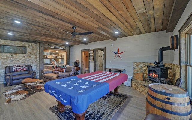101 Hideaway Trl, Copperhill, TN 37317 - recreation room with wood ceiling, recessed lighting, a wood stove, wood finished floors, and a ceiling fan