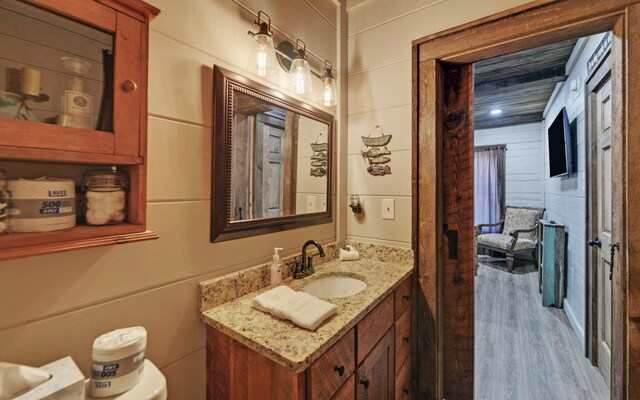 101 Hideaway Trl, Copperhill, TN 37317 - half bath with vanity, toilet, and wood finished floors