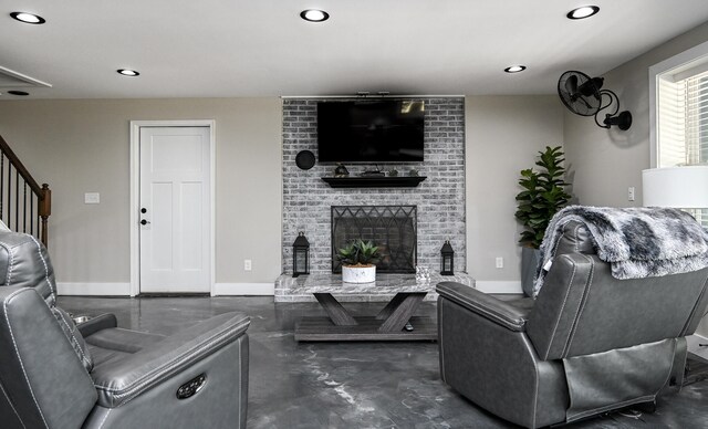 living room featuring a fireplace