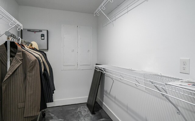 spacious closet featuring electric panel