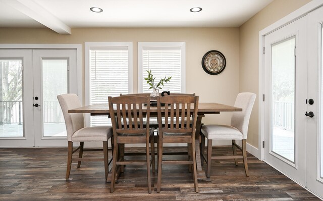 dining space featuring beamed ceiling, dark wood-type flooring, and french doors