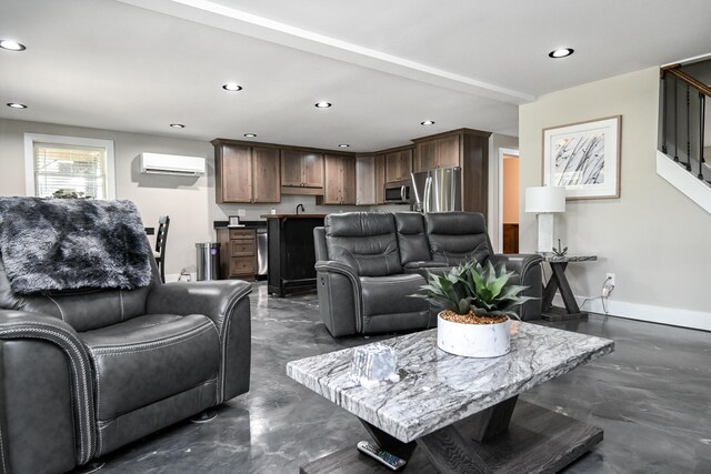 living room featuring a wall unit AC