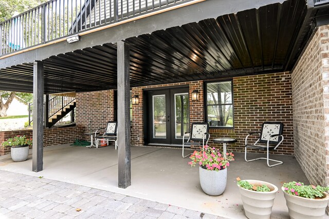 view of patio featuring french doors