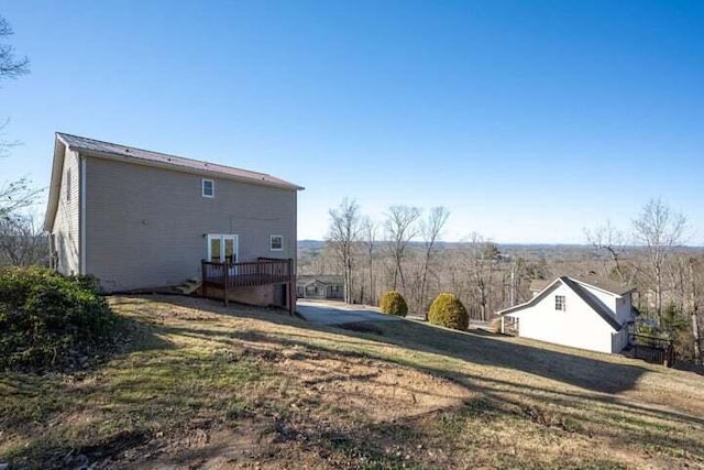 view of yard featuring a deck