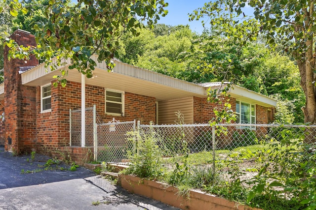 view of front of house featuring a carport