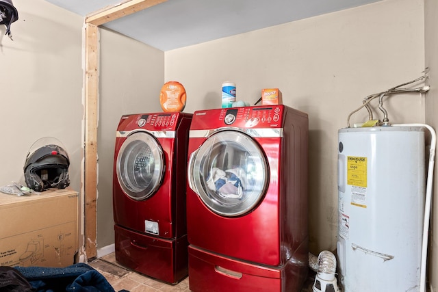 washroom featuring separate washer and dryer and water heater